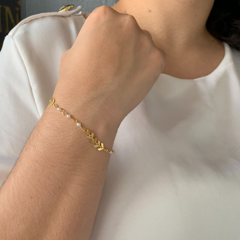 PULSEIRA FLECHAS E PEROLAS - BANHADO A OURO 18K