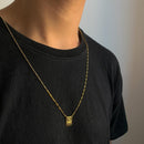 ESCAPULÁRIO NOSSA SENHORA DE NAZARÉ E CRISTO ELO CADEADO LONG - 70 CM - BANHADO A OURO 18K.