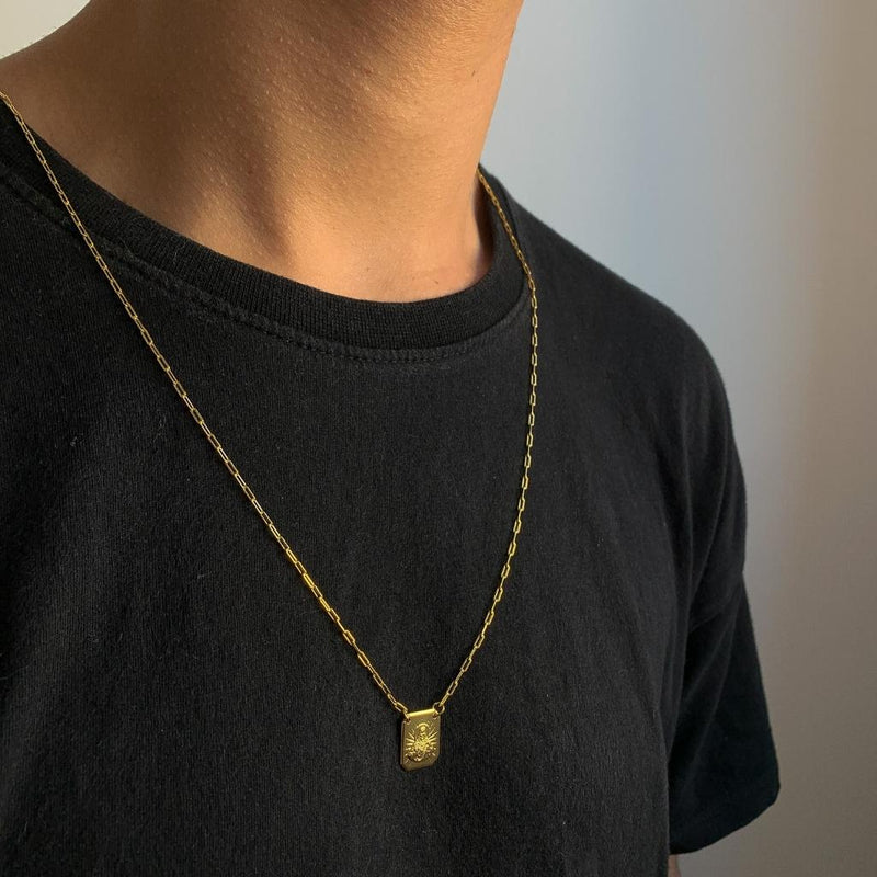 ESCAPULÁRIO NOSSA SENHORA DE NAZARÉ E CRISTO ELO CADEADO LONG - 70 CM - BANHADO A OURO 18K.